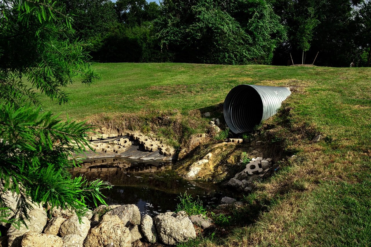 Drainage culvert carrying water away across a Hartford property